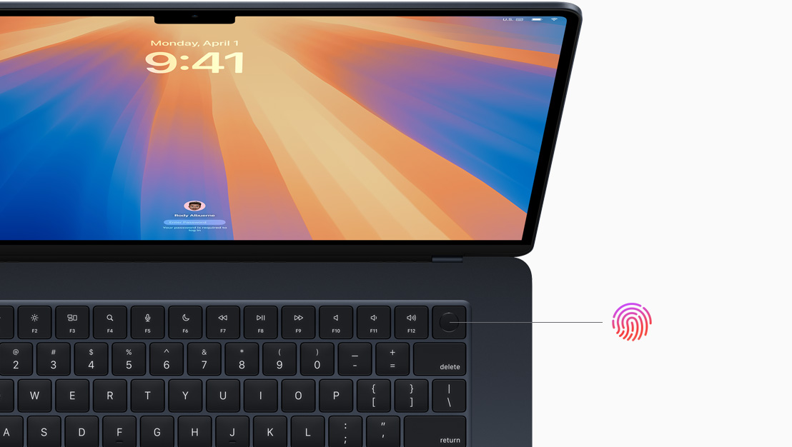 Отворен MacBook Pro в астро черно, на който се демонстрира местоположението на Touch ID бутона.