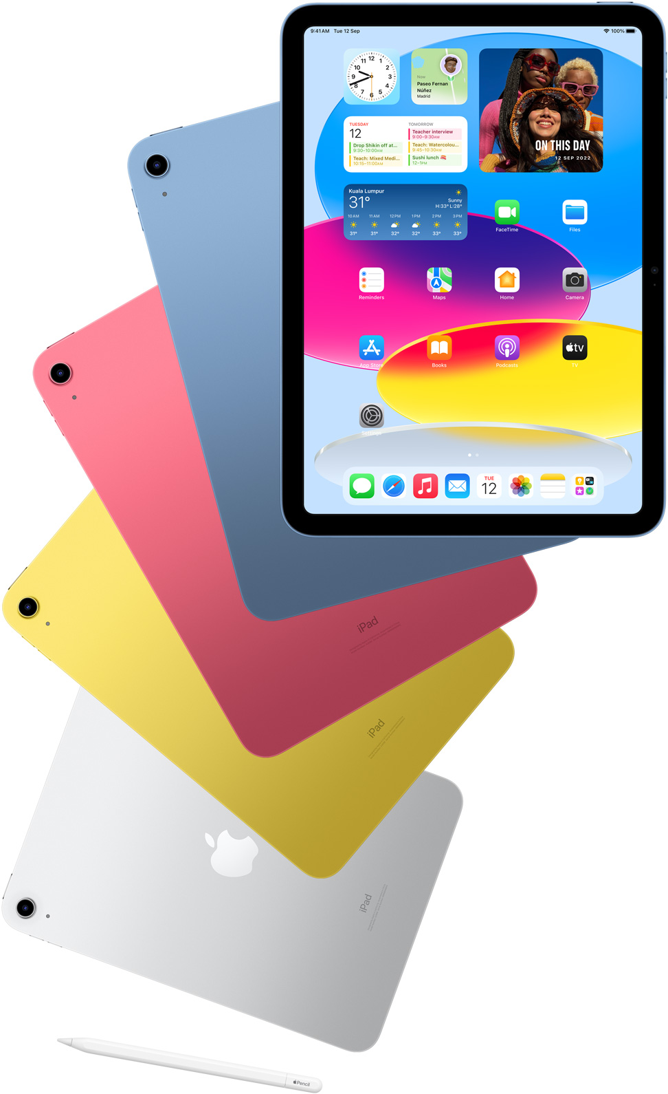 Front-view iPad shows home screen with blue, pink, yellow and silver rear-facing iPads behind it. An Apple Pencil sits near the arranged iPad models.