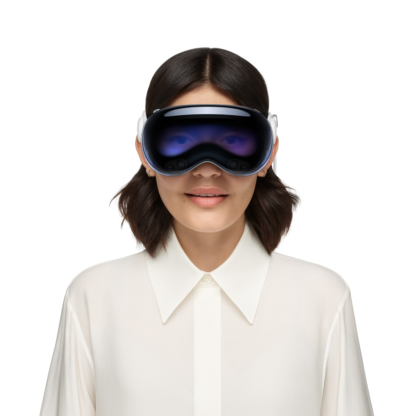 Person wearing Apple Vision Pro, with eyes revealed through an outward display